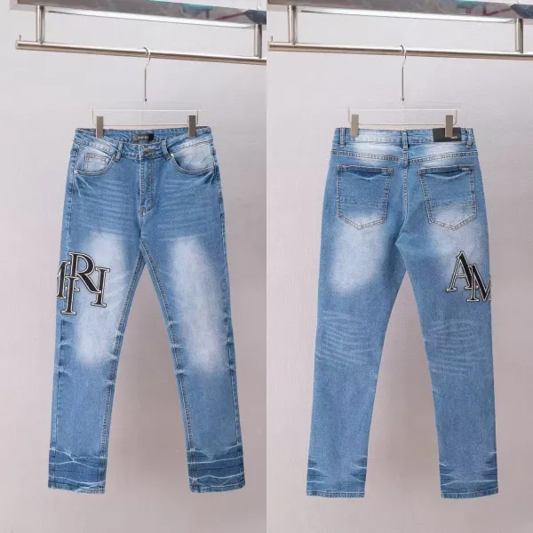 Amiri Logo Embroidered Slim Fit Light Wash Jeans - 1