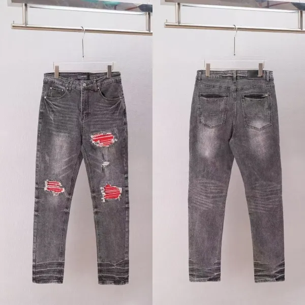 Amiri Distressed Gray Jeans with Red Patch Detail - 1
