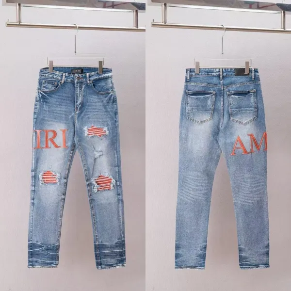 Amiri Distressed Logo Jeans Blue - 1