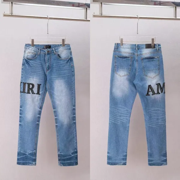 Amiri Logo-Embellished Distressed Slim Fit Jeans Blue - 1