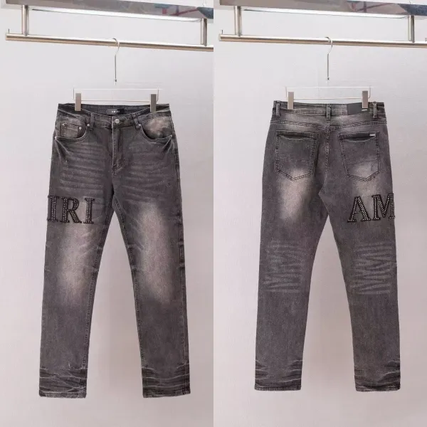 Amiri Logo-Embroidered Distressed Gray Jeans - 1