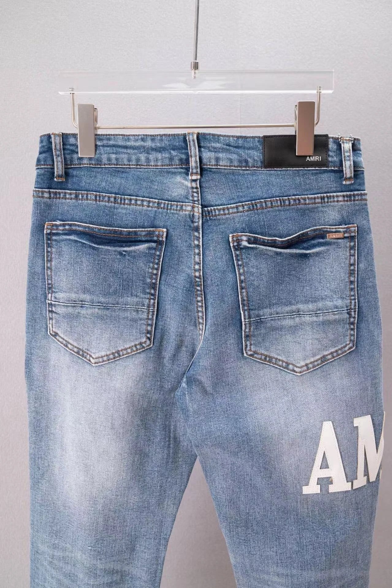 Amiri Distressed Logo Jeans Light Wash Blue - 9