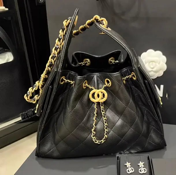 Chanel Drawstring Bucket Bag Black Quilted Leather with Gold Hardware Handbags