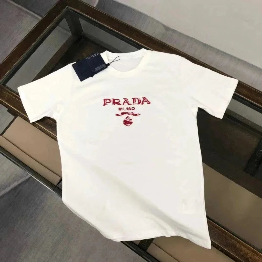 Prada Shirts Short-Sleeve Polo Shirt with Triangle Logo Patch — 25