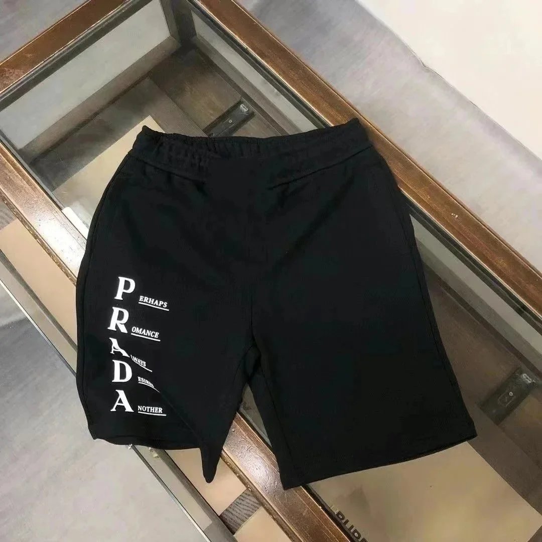 Prada Shirts Short-Sleeve Polo Shirt with Triangle Logo Patch — 31