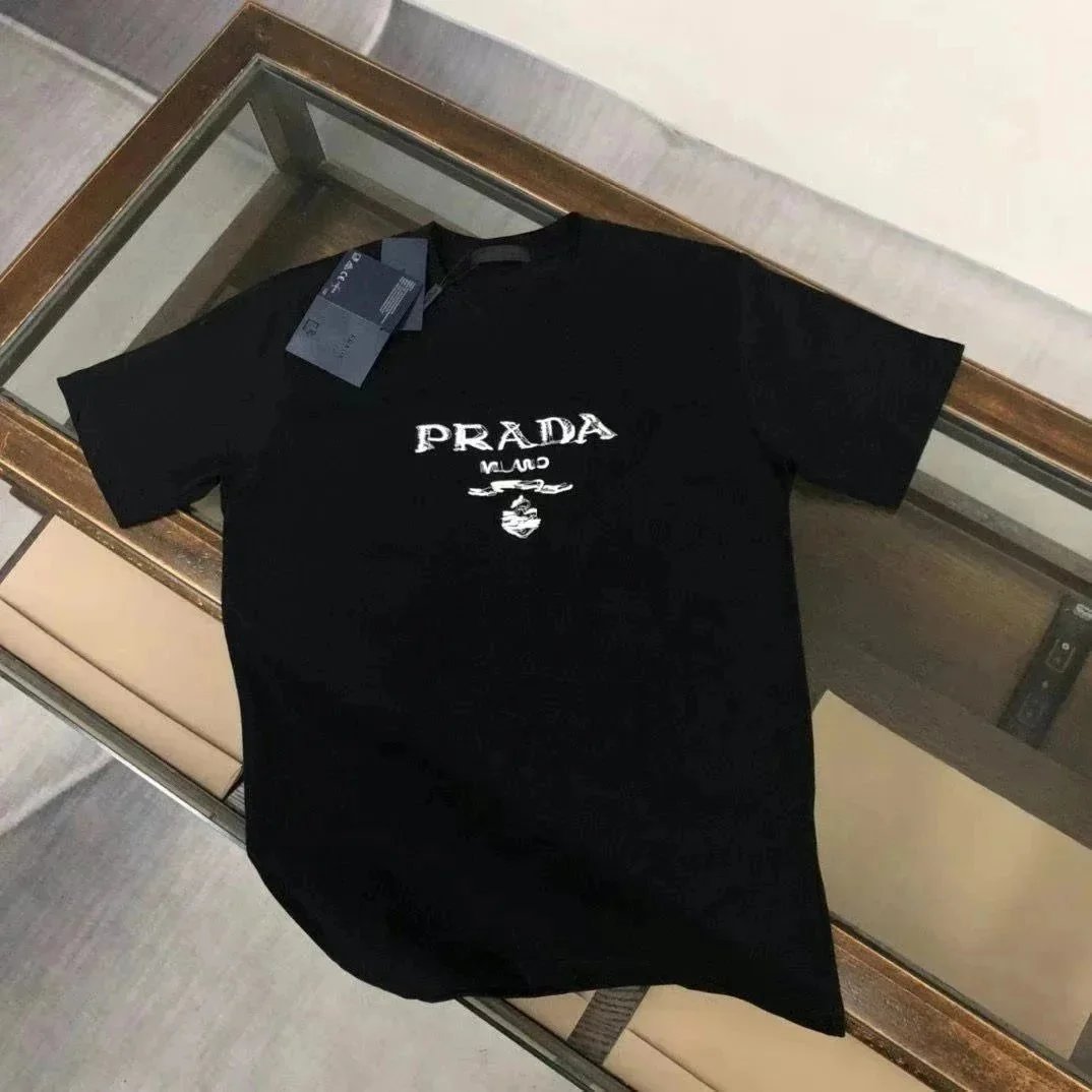 Prada Shirts Short-Sleeve Polo Shirt with Triangle Logo Patch — 26