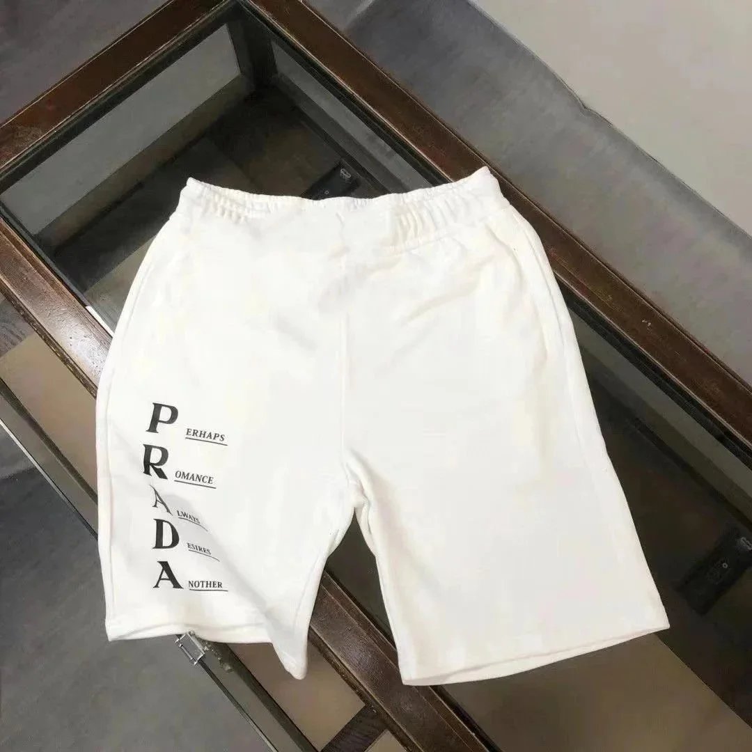 Prada Shirts Short-Sleeve Polo Shirt with Triangle Logo Patch — 32
