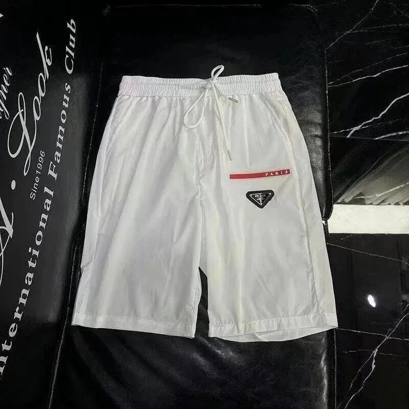 Prada Shirts Short-Sleeve Polo Shirt with Triangle Logo Patch — 36