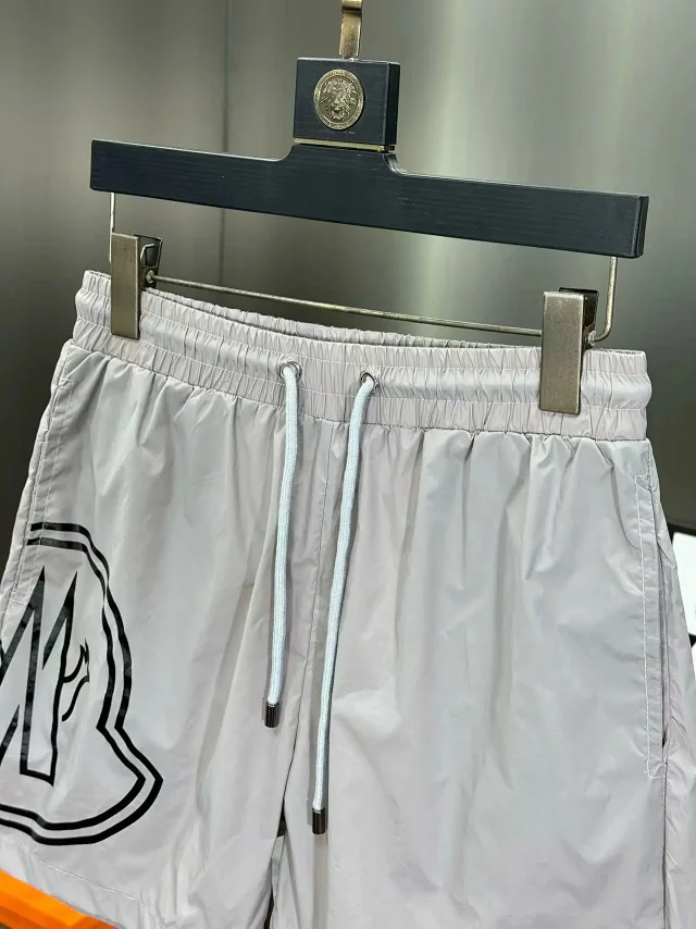 Moncler Swimwear Logo-print drawstring swim shorts product detail image 10