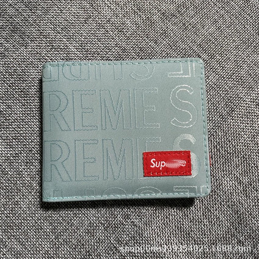 Blue embroidered wallet with box