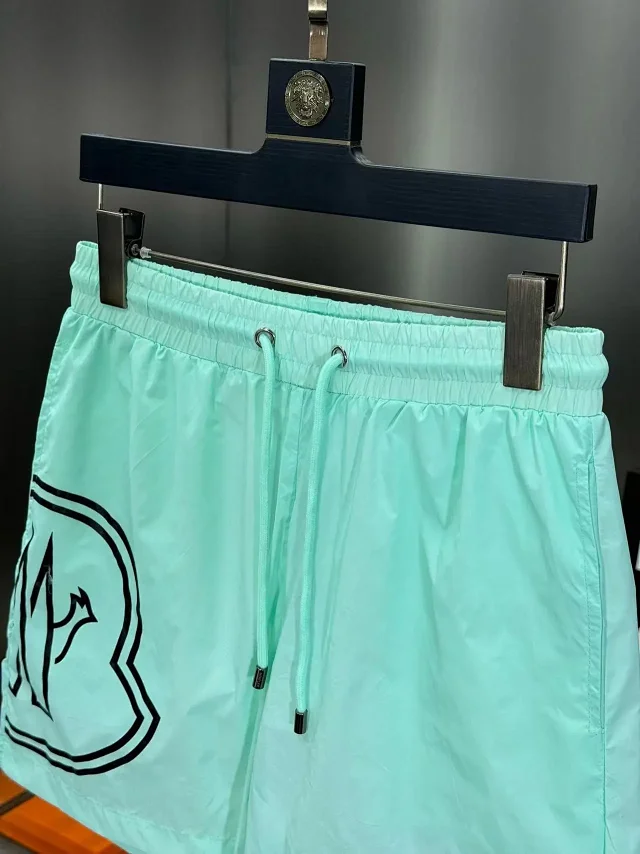 Moncler Swimwear Logo-print drawstring swim shorts product detail image 14