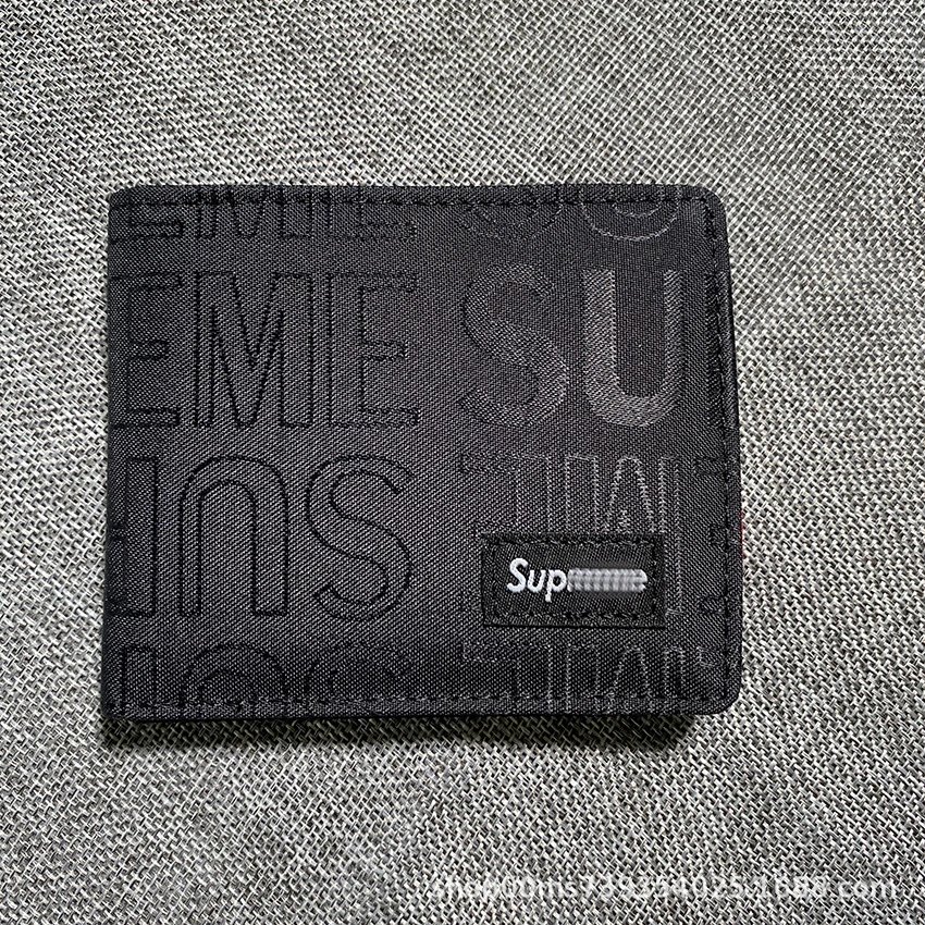 Black embroidered wallet with box