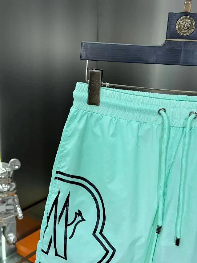 Moncler Swimwear Logo-print drawstring swim shorts product detail image 16