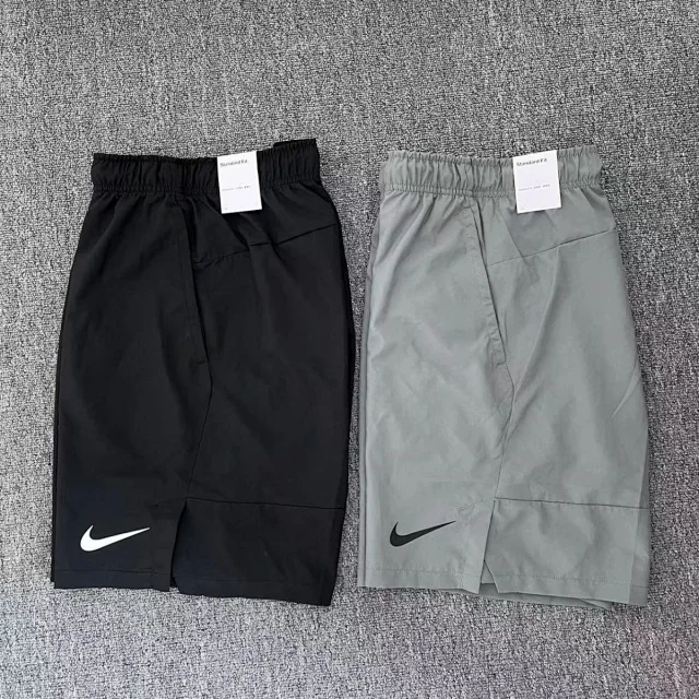 Nike Shorts Woven athletic with side pockets and split hems product detail image 1
