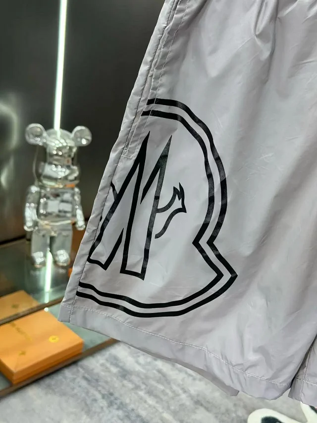 Moncler Swimwear Logo-print drawstring swim shorts product detail image 6