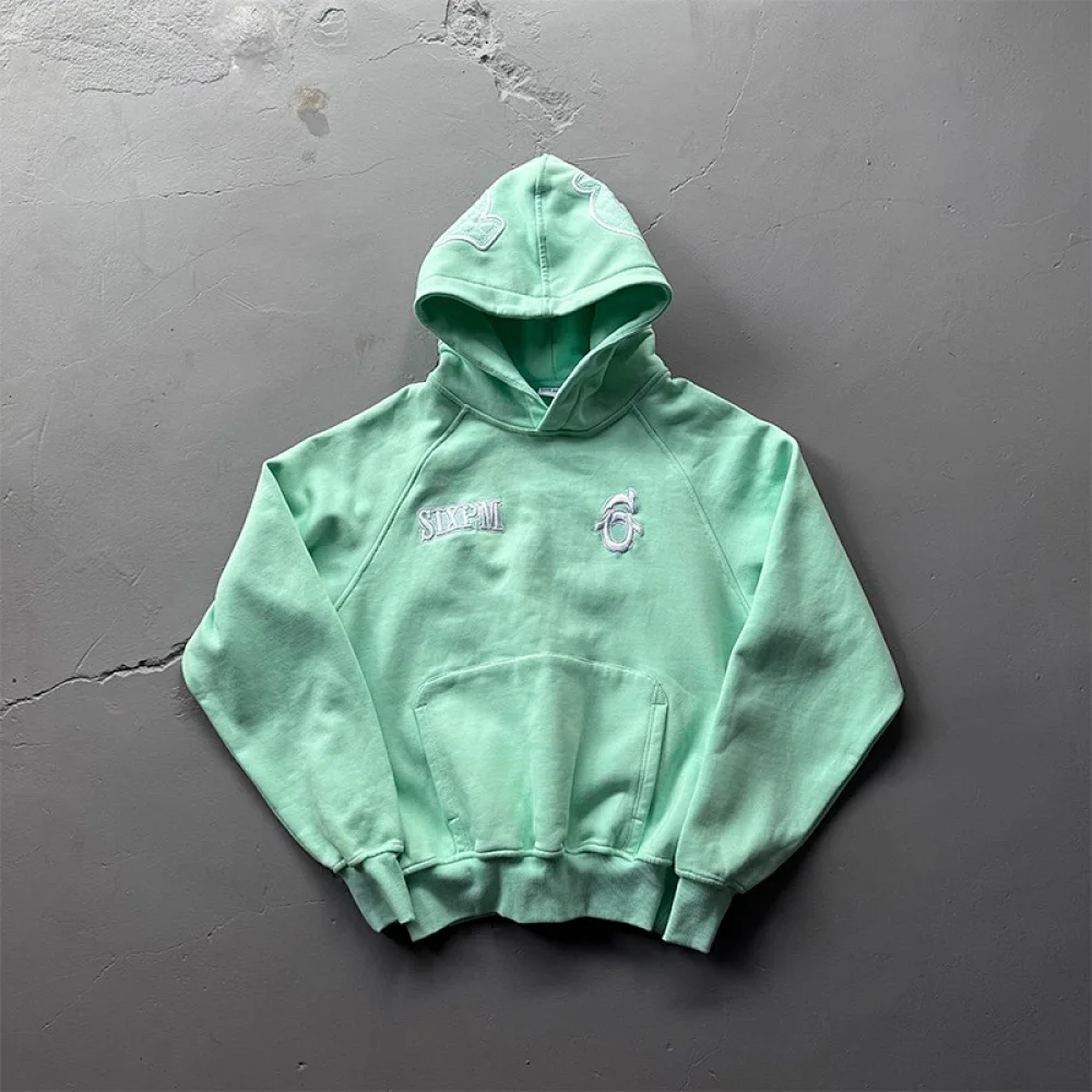 This hooded sweatshirt from 6PM (Sixpm) is the same style worn by British rapper Central Cee.