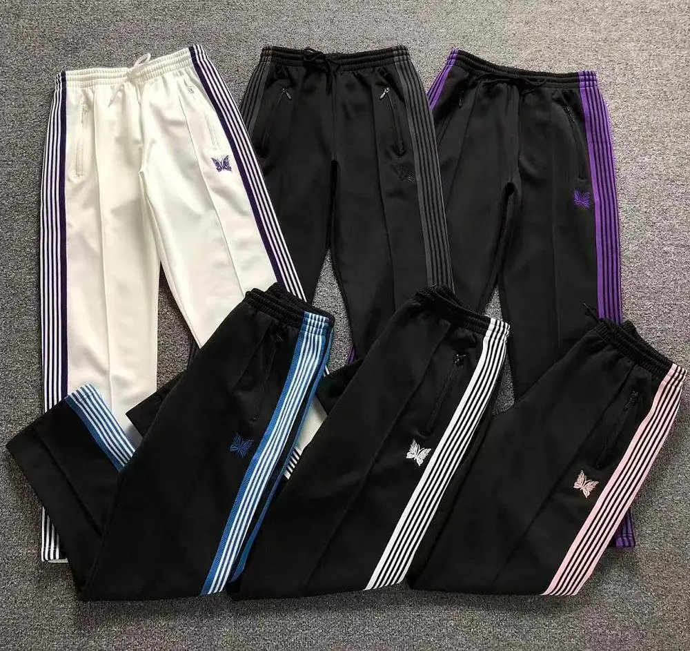 Needles butterfly embroidered striped track pants — W2CFinds curated find
