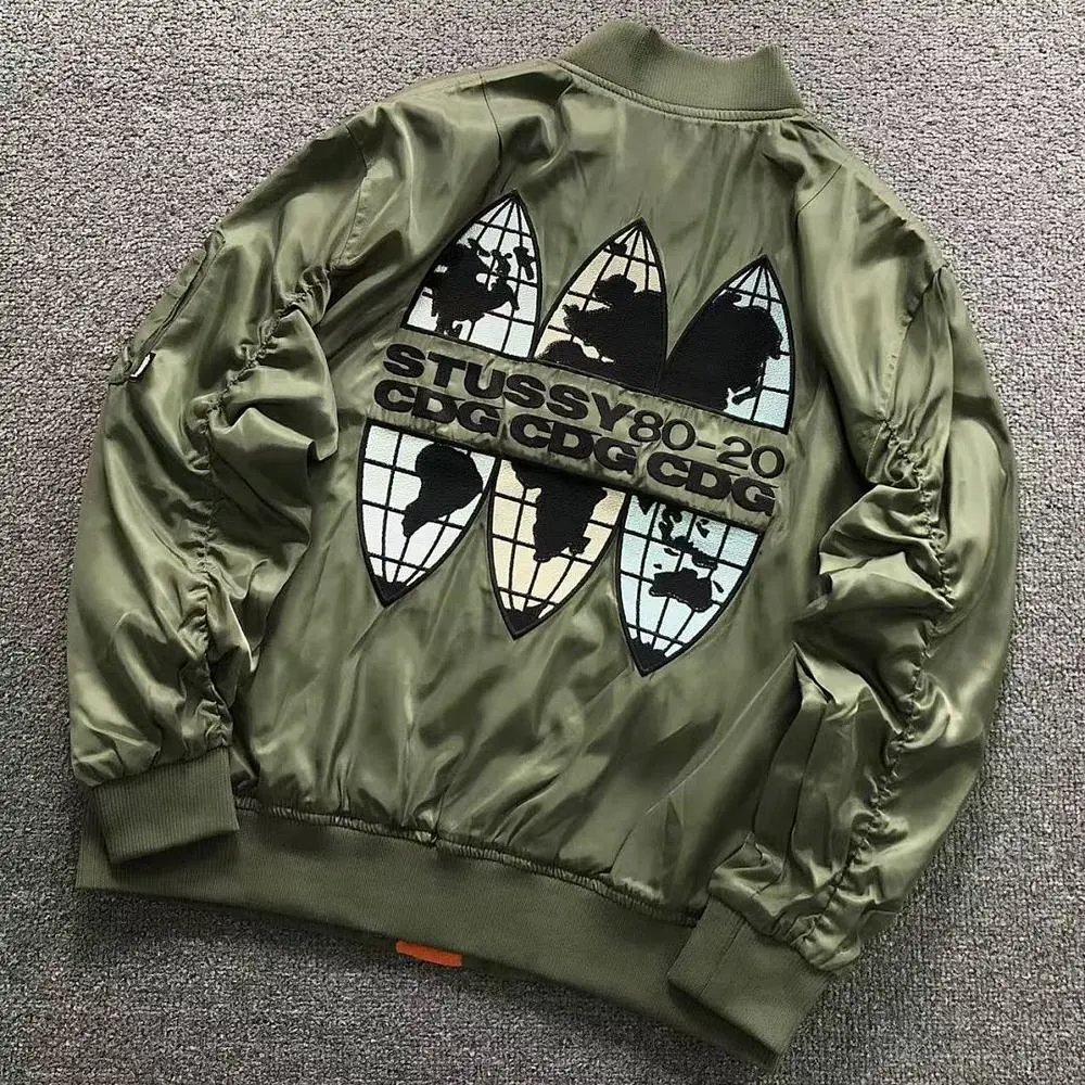 Stussy x CDG globe embroidered bomber jacket — W2CFinds curated find