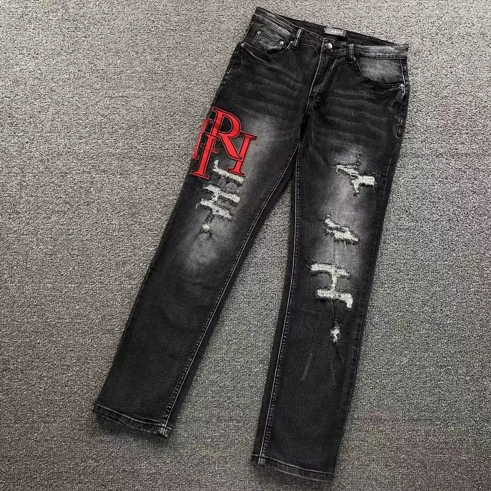 Amiri red logo ripped jeans — W2CFinds curated find