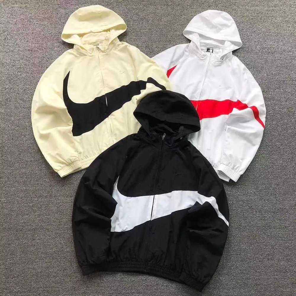 Nike big swoosh hooded windbreaker jacket — W2CFinds curated find