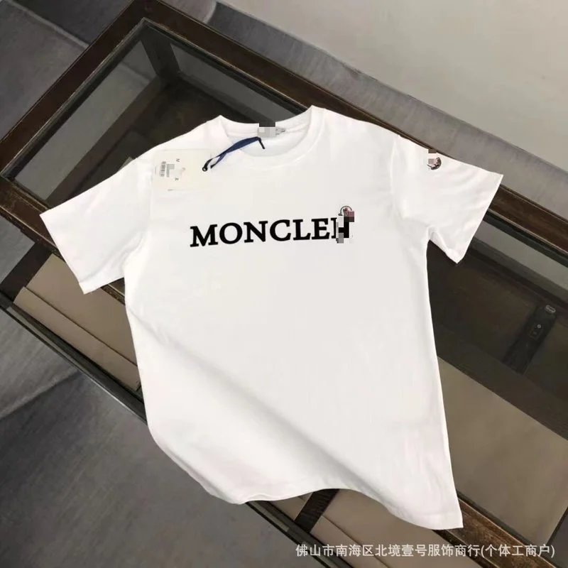 Moncler T-Shirts Logo-Print Crewneck T-Shirt — On white embroidery