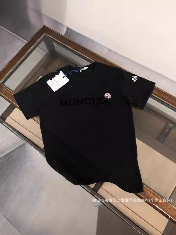Moncler T-Shirts Logo-Print Crewneck T-Shirt — On black embroidery