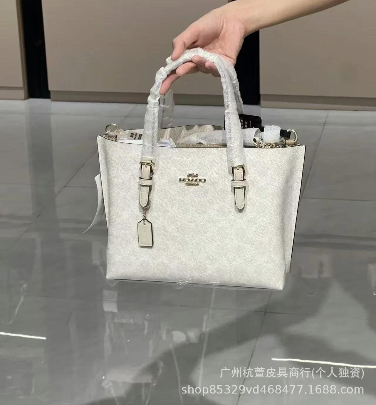 Coach - rep Coach