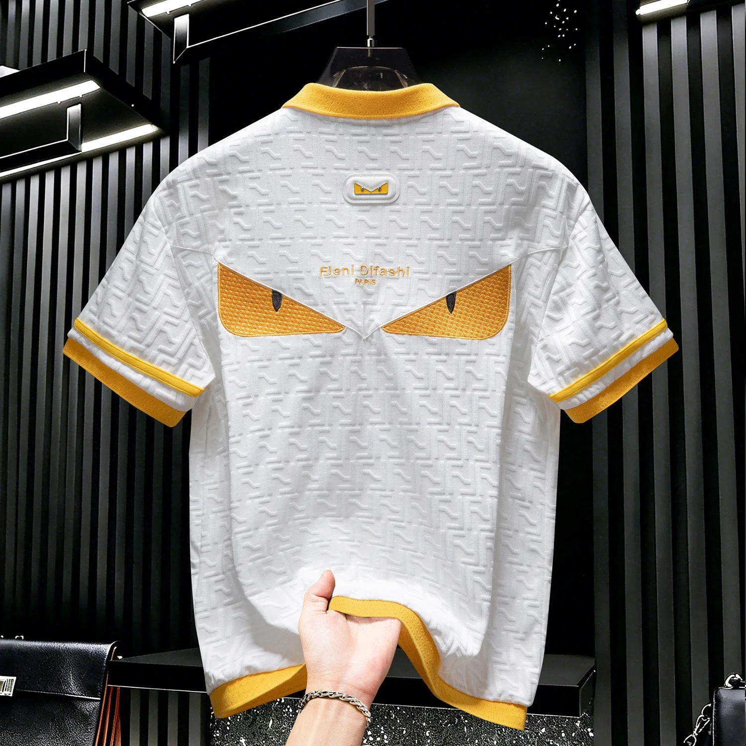Fendi-style "little monster" polo shirt