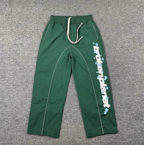 Broken Planet Trousers Drawstring straight-leg graphic — Green