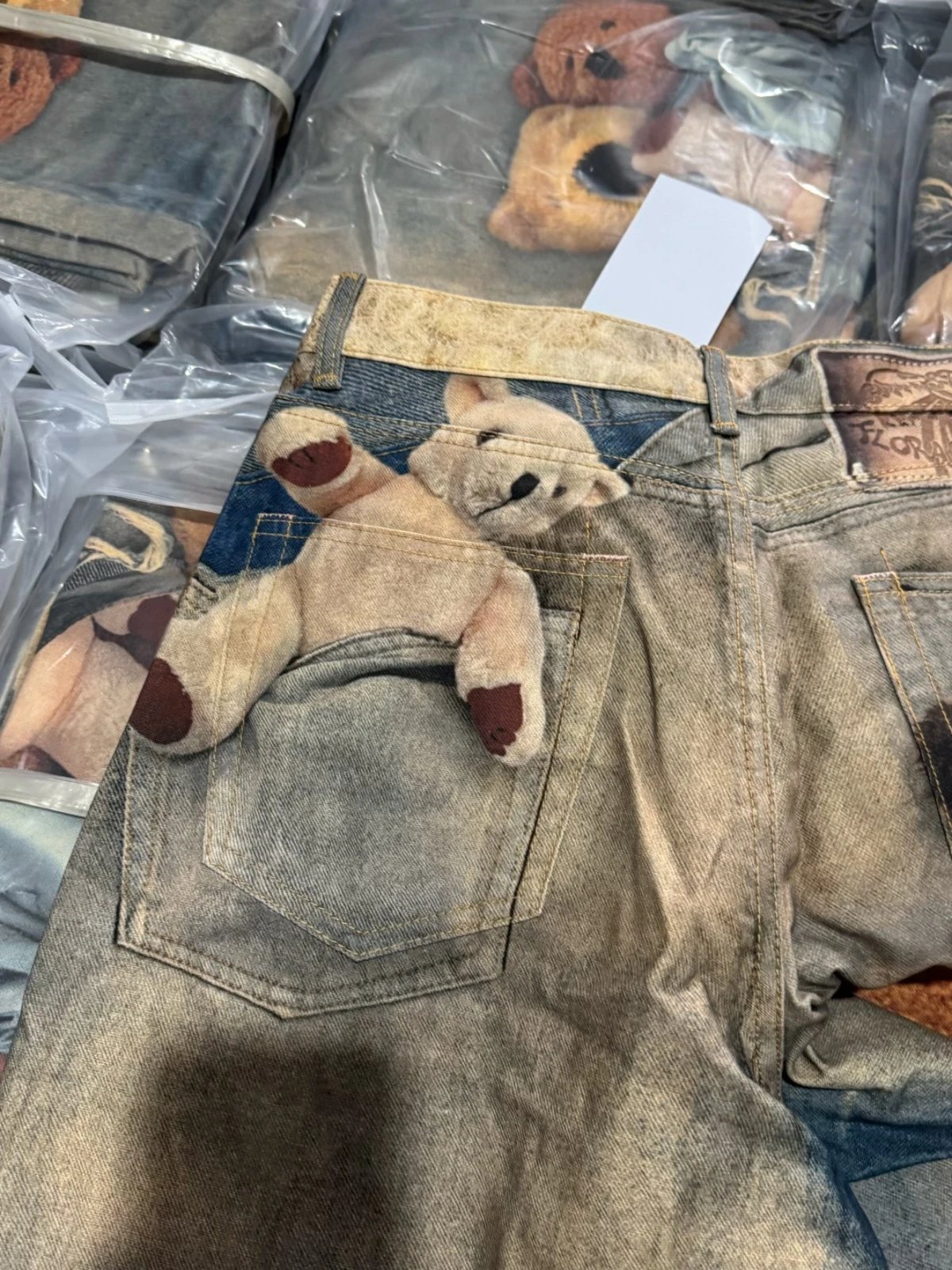 Maison Margiela x Teddy Bear Print Distressed Wide-Leg Jeans with Embellished Plush Scarf - 9