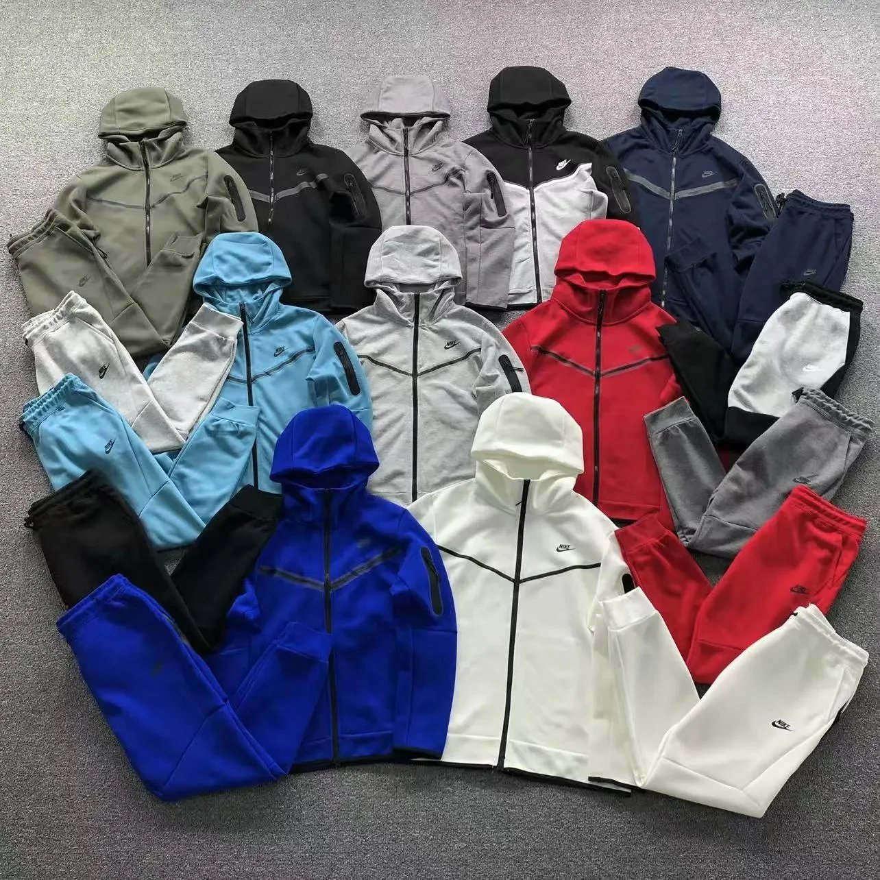 Nike Tracksuits Hooded zip-up tracksuit with chevron chest panel product image