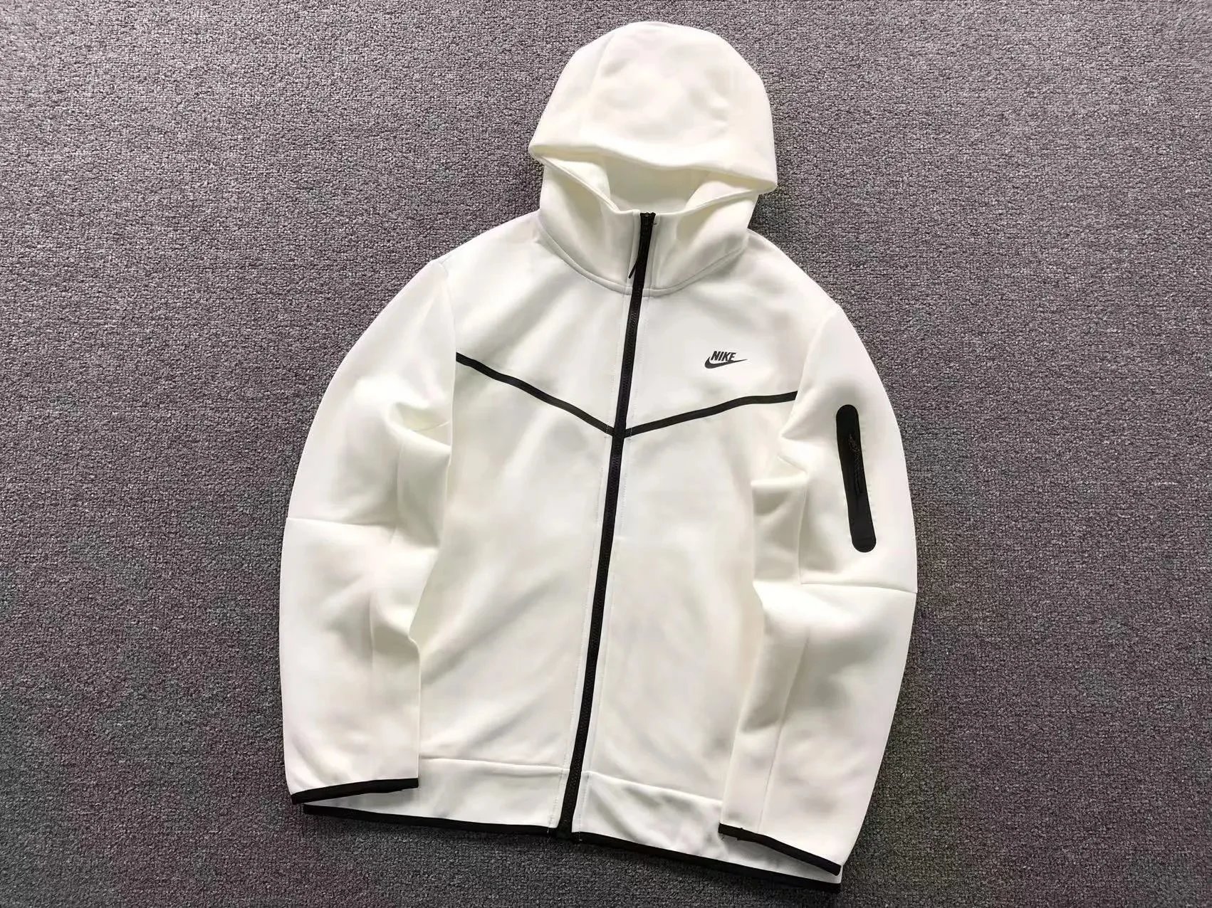 Nike Tracksuits Hooded zip-up tracksuit with chevron chest panel — 01