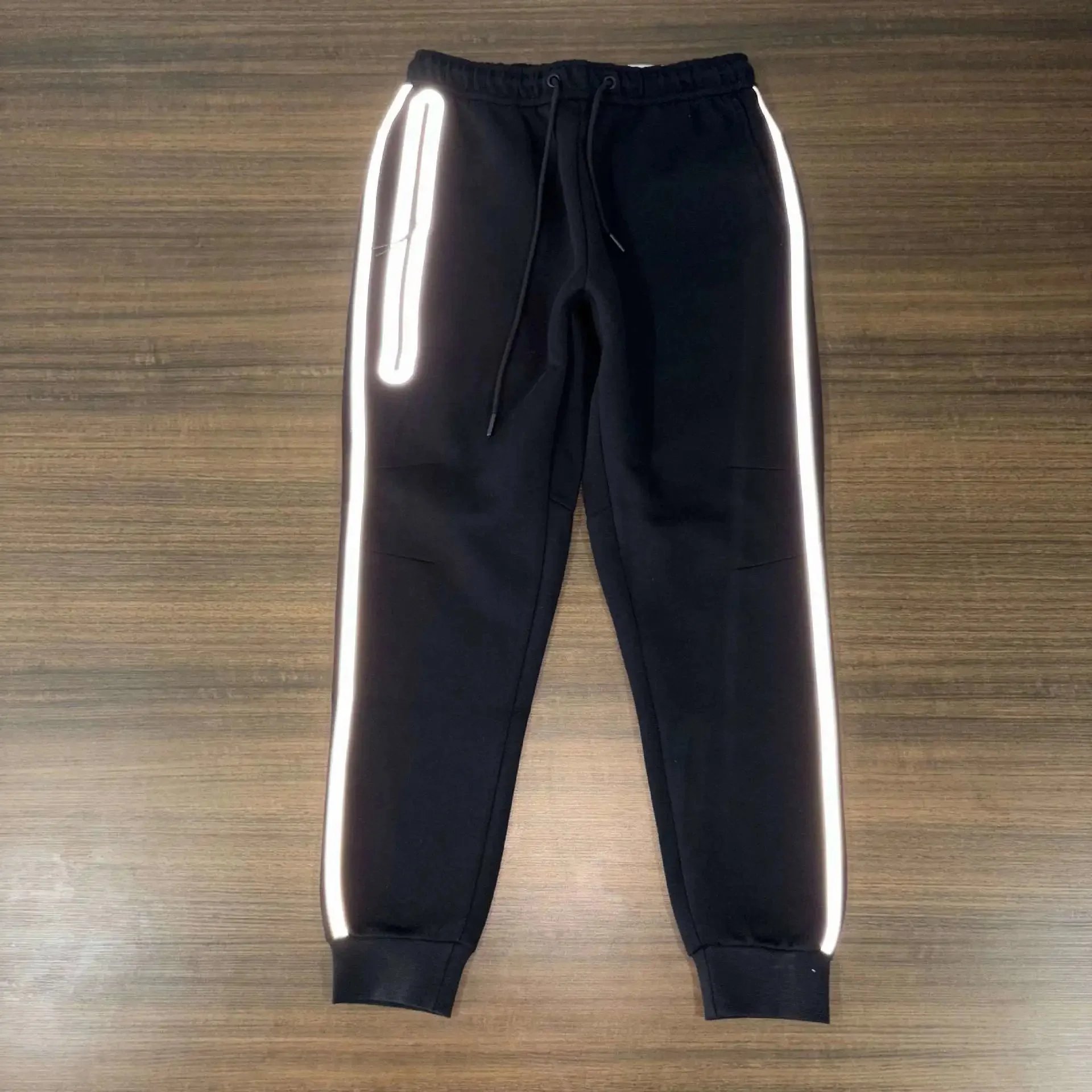Unbranded Matching Sets Hooded Zip-Up Reflective-Trim Tracksuit Set — Black pants with orange labels