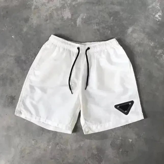 Prada Swimwear Drawstring Swim Shorts with Triangle Logo Patch image 3
