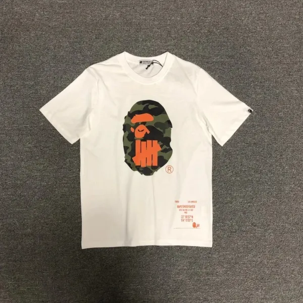 A Bathing Ape x Undefeated Camo Ape Head White T-Shirt - 1
