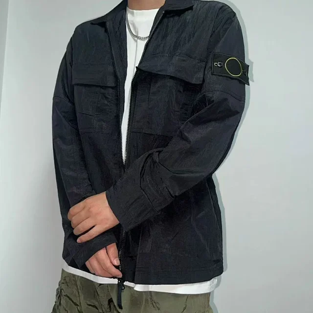 Stone Island Jackets Zip-front utility jacket with chest flap pockets and detachable compass sleeve badge product detail image 9