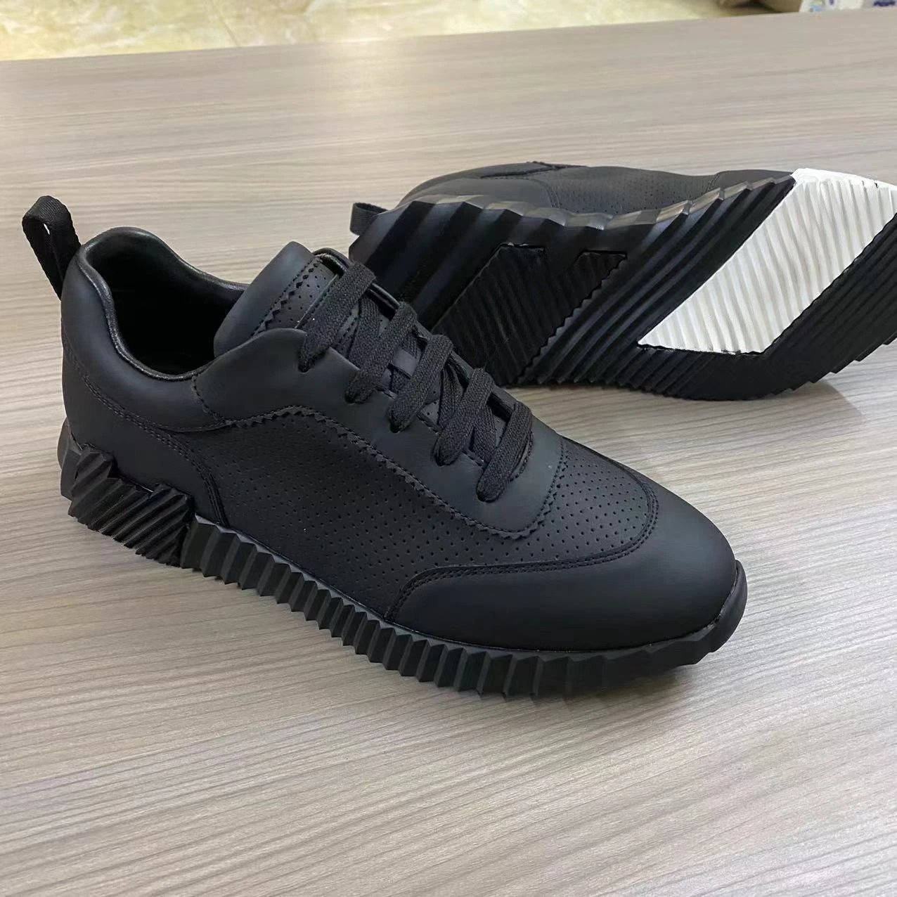 Figure 22 Black Perforated Leather Upper