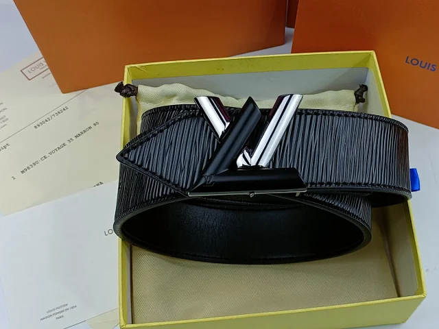 Louis Vuitton Belts Black textured belt with LV initial buckle product detail image 11