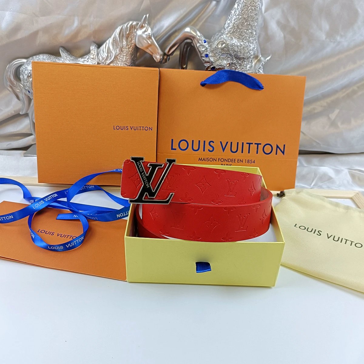 Louis Vuitton Belts Monogram embossed belt with LV buckle — 1