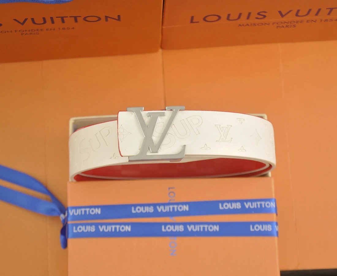 Louis Vuitton Belts Tiger-head buckle belt with monogram and graphic patches — 16