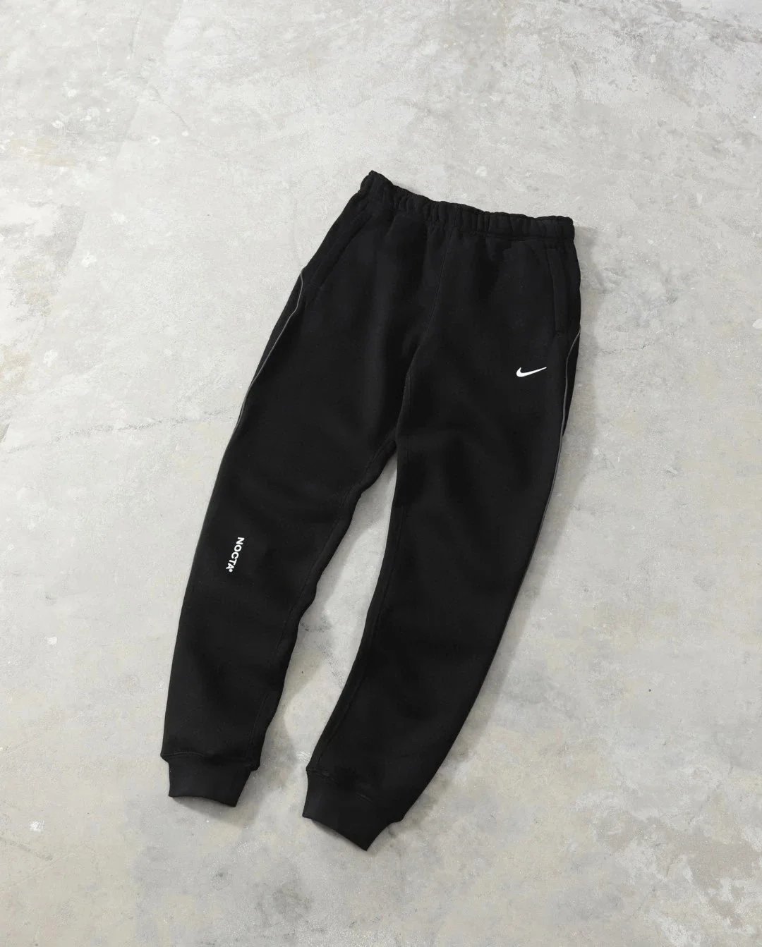 Black and white edged pants
