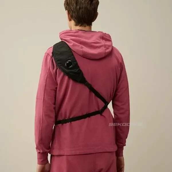 C.P. Company Goggle Pocket Hoodie Set in Pink with Black Crossbody Bag - 6