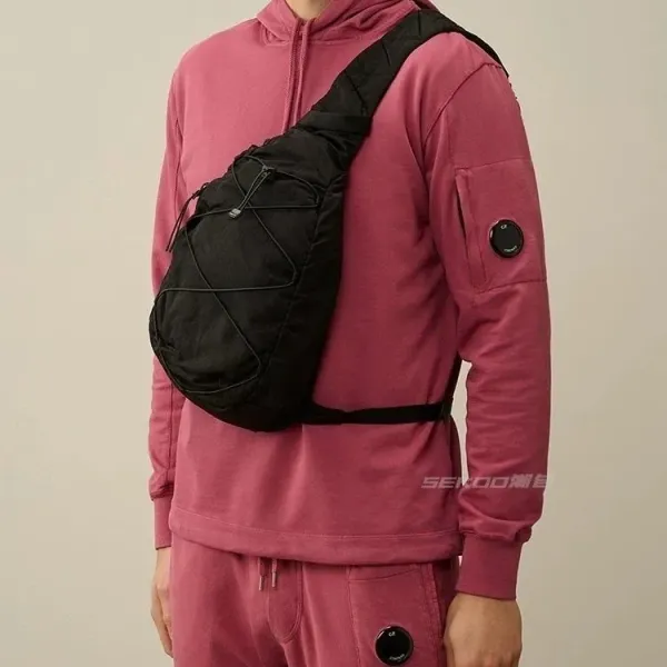 C.P. Company Goggle Pocket Hoodie Set in Pink with Black Crossbody Bag - 1