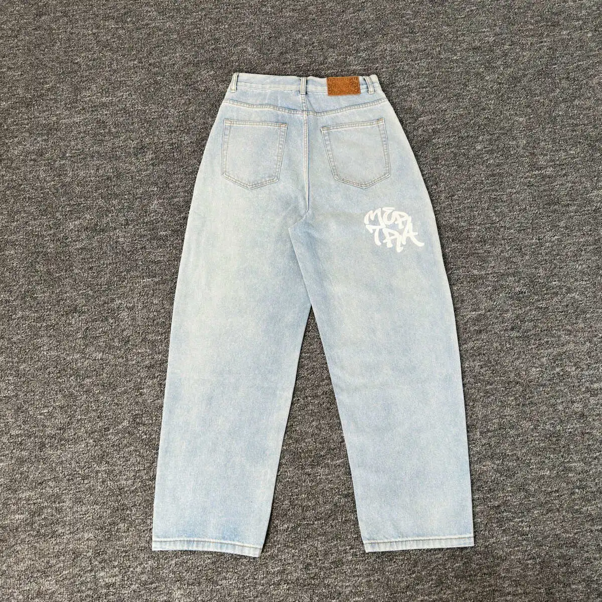 Murd33r — Klein Blue, Light Blue Washed Denim Wide-Leg Trousers with Graffiti Letter Print