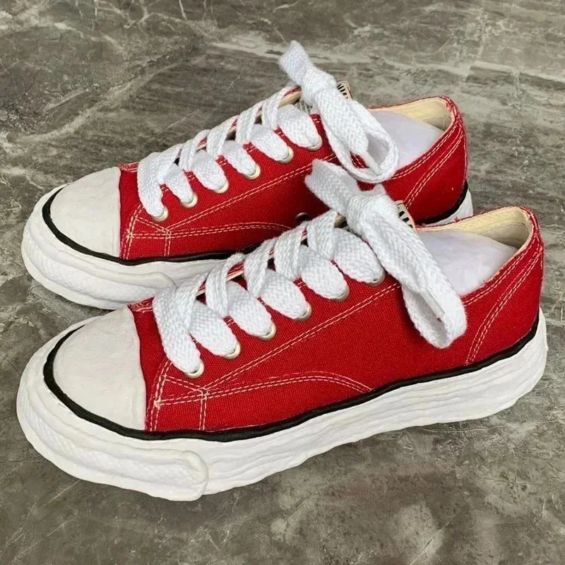 OCDM Red Sneakers