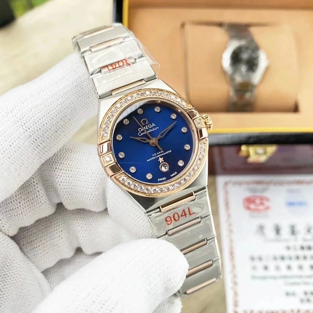 Diamond bezel, rose gold case, blue dial, steel bracelet