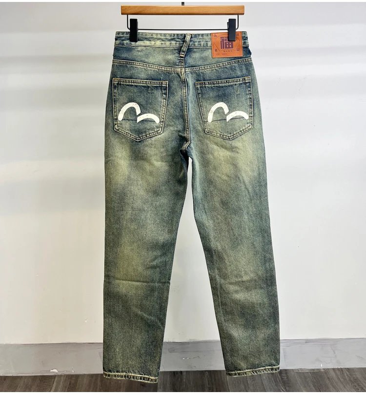 Light blue washed white small M print