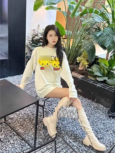 Design Cartoon Graphic Oversized Sweater Dress in Cream with Knee-High Boots - 1