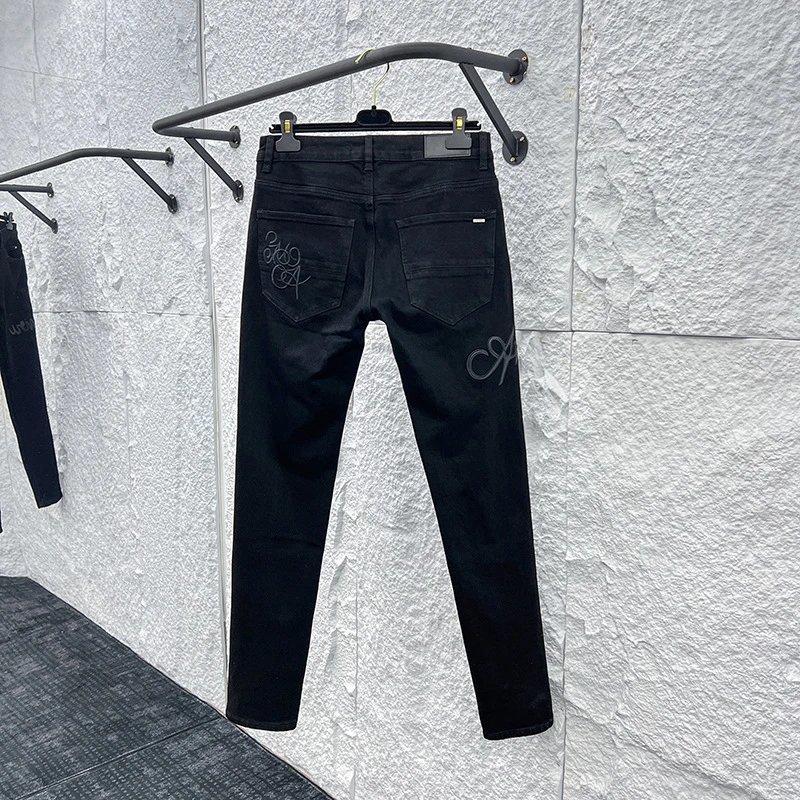 Water Washed Distressed Slim Jeans photo 2