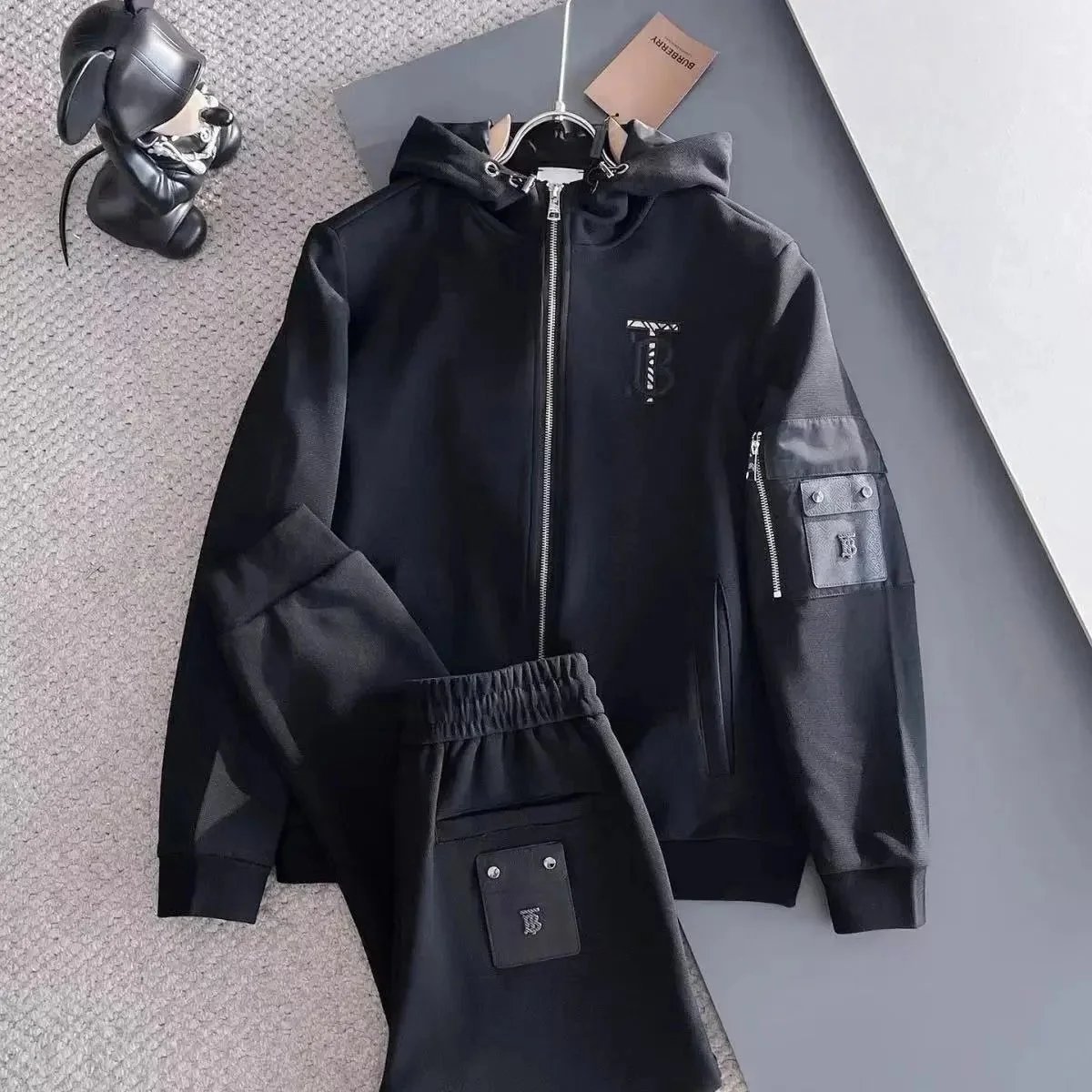 Prada Tracksuits Black zip-up hooded tracksuit with triangle logo patches — hot burberry suit02